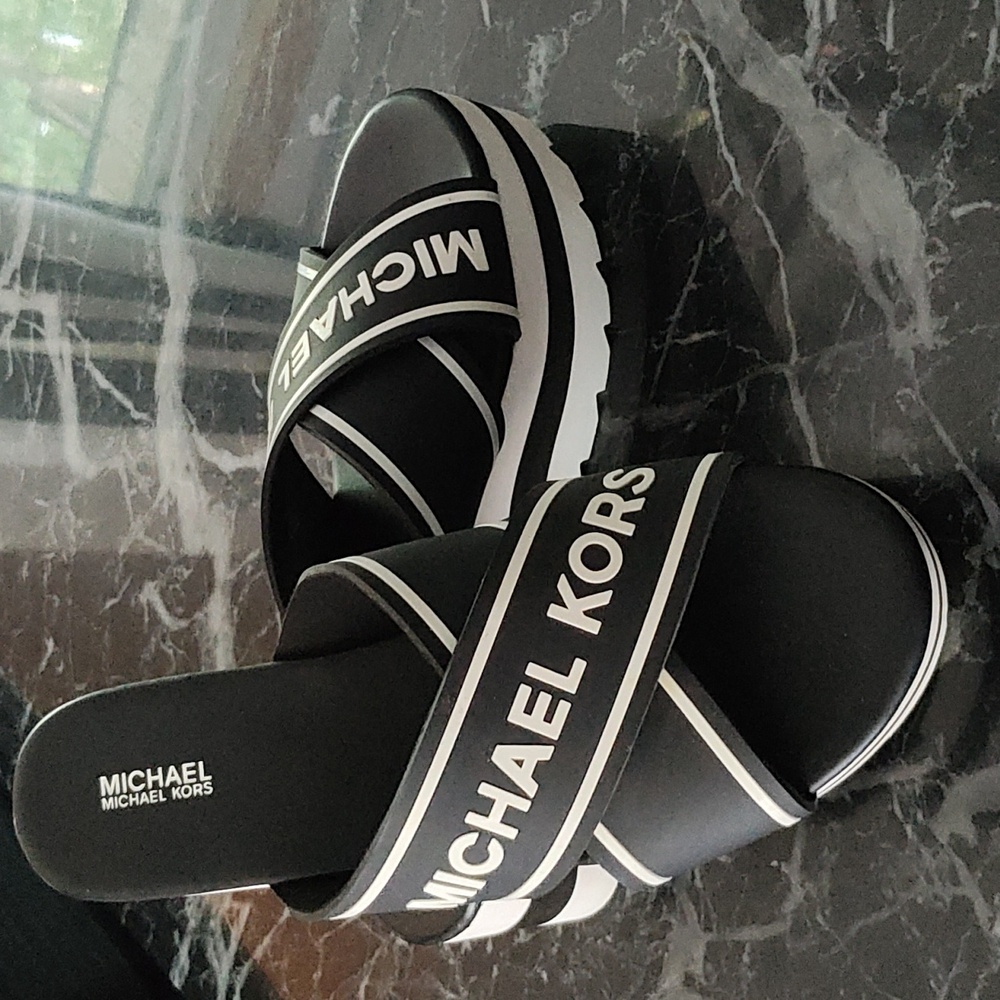 Michael Kors criss cross wedge sports sandals in a size 8.